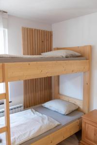 Postel nebo postele na pokoji v ubytování Hiša Bistrica