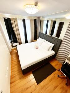 Ένα ή περισσότερα κρεβάτια σε δωμάτιο στο Cozy Suites 2BR Condotel in Davao City Near airport, Sasa wharf going to samal, SMX SM lanang