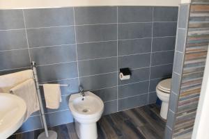 Koupelna v ubytování Sa Dommu de Kerciu vista mare IUN R0018
