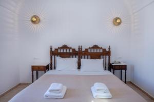 Letto o letti in una camera di Aldea