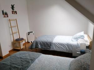 En eller flere senge i et værelse på Ático en Ribeira Ría de Arousa