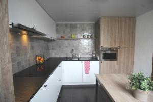 Majoituspaikan Het Rustplekje keittiö tai keittotila