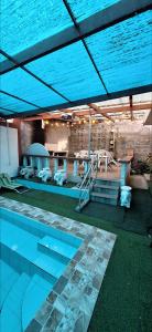 Πισίνα στο ή κοντά στο Casa y Campo ec con piscina +4 φωτογραφίες
