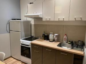 Dapur atau dapur kecil di Miramar Studio & Flats +35 gambar