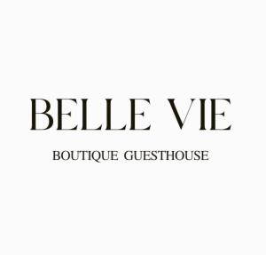 a sign for a bella vita boutique guest house at Belle Vie Boutique Guesthouse in Pretoria +1 photo
