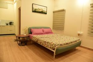 Studio Room in Vijayanagar客房内的一张或多张床位