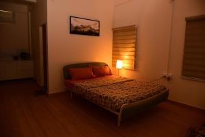 Studio Room in Vijayanagar客房内的一张或多张床位