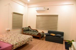 Studio Room in Vijayanagar的休息区