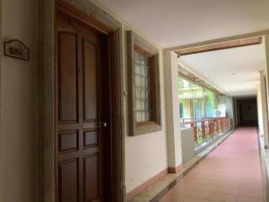 an empty hallway with a door and a balcony at Private 1BR Apartment - Jayakarta Resort Legian Beach in Seminyak +18 photos