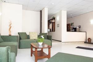 Posezení v ubytování Relax Inn Hotel