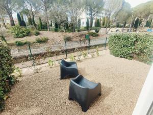 Vonkajšia záhrada v ubytovaní Le Baou Beni - Piscine, Climatisation & Parking