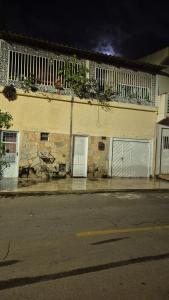 a building with two doors on the side of it at Casa Margarida in Brasília