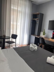 Postel nebo postele na pokoji v ubytování B&B MariLù