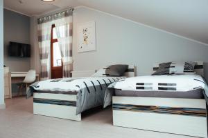Voodi või voodid majutusasutuse Fresco Hostel toas