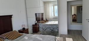 Postel nebo postele na pokoji v ubytování City Apartment Sairaalakatu, lämmin sähköistetty autotalli sisältyy hintaan