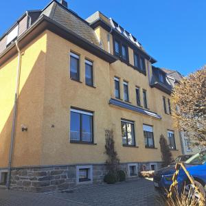 a large brick building with a lot of windows at Ferienwohnung Reichel in Freiberg
