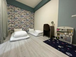 Letto o letti in una camera di 洄游民宿 Migration B&B