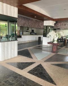 a lobby with a star pattern on the floor at Sea sand Sun condominium 415 in Thang Kwian +14 photos