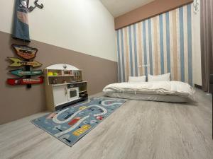 Letto o letti in una camera di 洄游民宿 Migration B&B