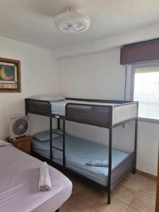 Ένα ή περισσότερα κρεβάτια σε δωμάτιο στο Apartamento ILA
