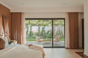 Ένα ή περισσότερα κρεβάτια σε δωμάτιο στο Biet Thu Premium Hang Sang +28 φωτογραφίες