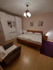 Postel nebo postele na pokoji v ubytování Apartman Peric