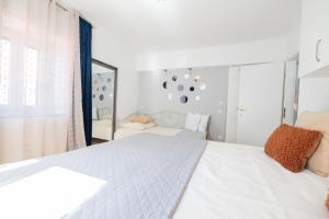 Postel nebo postele na pokoji v ubytování Guesthouse Rebecca