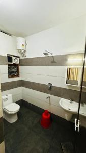 Koupelna v ubytování Hodophile Wayanad Homestay + 6 fotografií