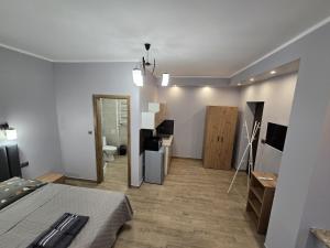 Posteľ alebo postele v izbe v ubytovaní Apartamenty Pokoje DreamZone