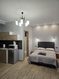 Posteľ alebo postele v izbe v ubytovaní Apartamenty Pokoje DreamZone