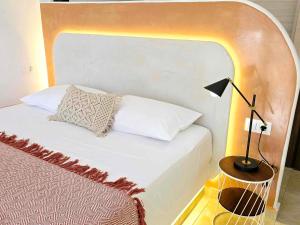 Postel nebo postele na pokoji v ubytování Papafotis Apartments & Suites