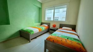 Katil atau katil-katil dalam bilik di Kasbah And Medina Parking Comfort and Charm