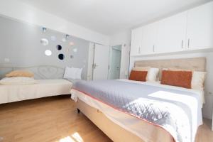Postel nebo postele na pokoji v ubytování Guesthouse Rebecca