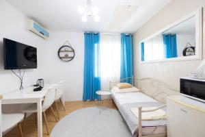 TV a/nebo společenská místnost v ubytování Guesthouse Rebecca