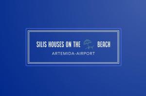 a sign that reads sits houses on the beach at Silis Houses on the beach in Artemida