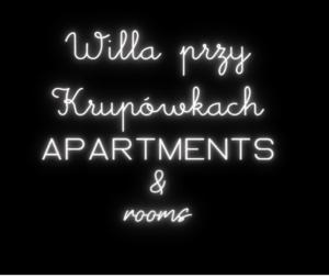 a sign that says wildularyciplinaryappartments and rooms at Willa przy Krupówkach in Zakopane +56 photos
