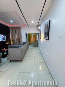 TV a/nebo společenská místnost v ubytování ResideX Apartment