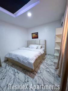 Voodi või voodid majutusasutuse ResideX Apartment toas