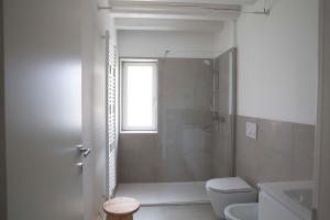 Koupelna v ubytování Al Ponticello + 14 fotografií