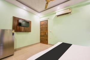 TV a/nebo společenská místnost v ubytování Hotel O Ridge Way Stays