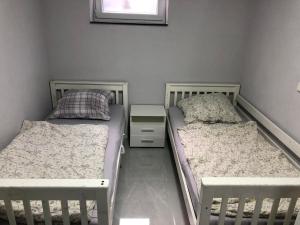 Ένα ή περισσότερα κρεβάτια σε δωμάτιο στο Ferienwohnung-Immanuel