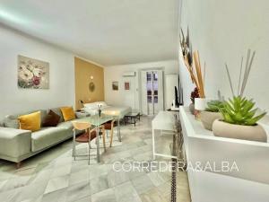 Część wypoczynkowa w obiekcie Habitaciones Casa Sevillana Centro