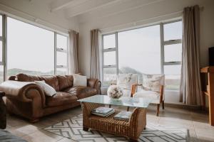 Χώρος καθιστικού στο Oysterbay Beach House