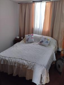 Voodi või voodid majutusasutuse Habitacion en apartamento en los alcazares cali toas