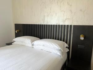 Voodi või voodid majutusasutuse SambuRoom B&B toas