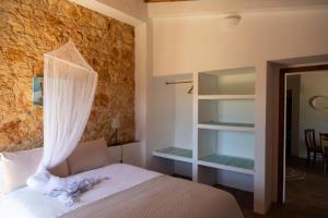 Postel nebo postele na pokoji v ubytování Casas na Vinha - Monte da Casteleja, Wine Estate - Eco Turismo Rural + 37 fotografií