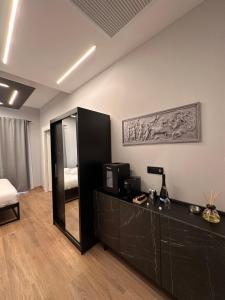 Eterna Suites Roma客房内的一张或多张床位