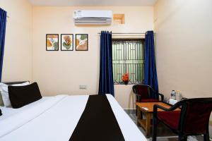 Ένα ή περισσότερα κρεβάτια σε δωμάτιο στο Super Hotel O Sai Lagoon +17 φωτογραφίες