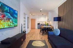 Η κουζίνα ή μικρή κουζίνα στο Lulu Apartments - LAGUNA - Apartament dwupokojowy - Sauna Netflix Chill PS4 - Blisko morza !