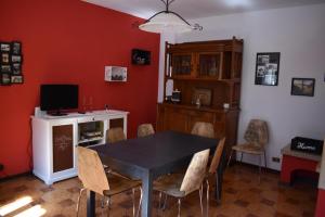 TV a/nebo společenská místnost v ubytování La Caliera 5 Casa Vacanze